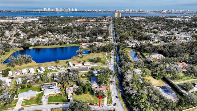 birds eye view of property featuring a water view