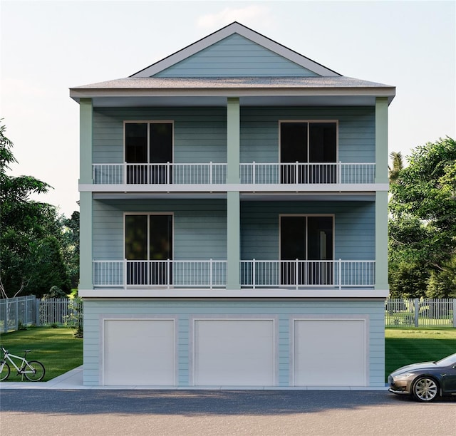 view of front of property with a balcony, a garage, and a front lawn