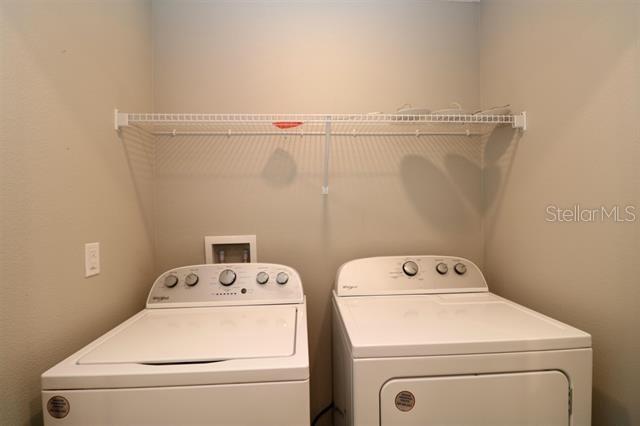 laundry area featuring independent washer and dryer