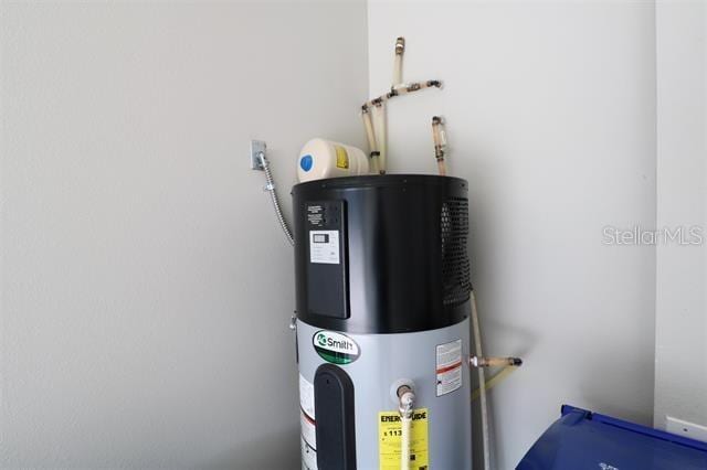 utility room with hybrid water heater