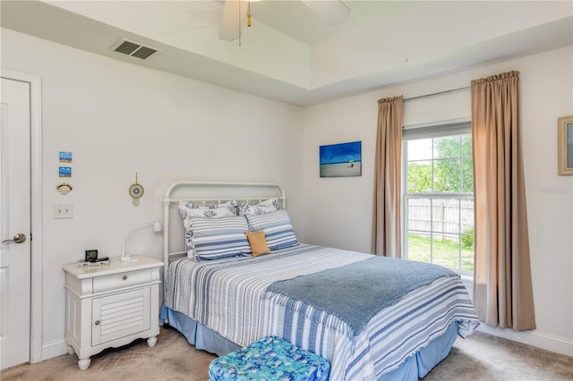 carpeted bedroom with ceiling fan