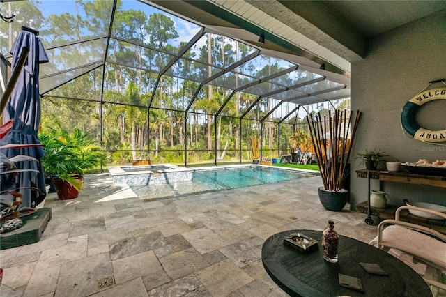 view of swimming pool with glass enclosure, a patio, and a pool with connected hot tub