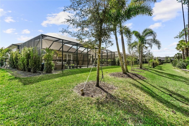 view of yard featuring glass enclosure