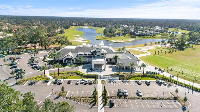 bird's eye view featuring a water view and golf course view