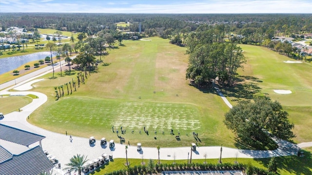 aerial view featuring view of golf course and a water view