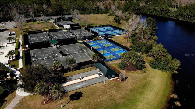 birds eye view of property featuring a water view