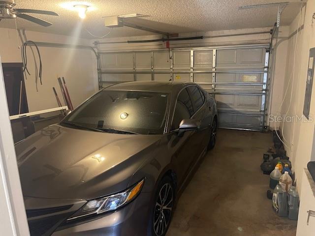 garage with ceiling fan