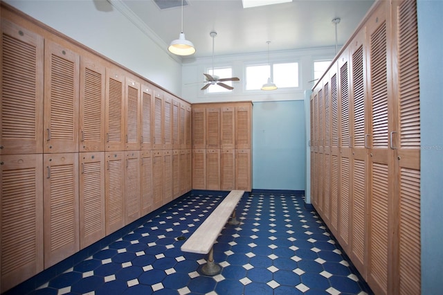 corridor featuring crown molding