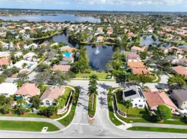 bird's eye view with a water view