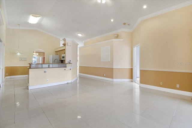 unfurnished living room featuring crown molding, high vaulted ceiling, and light tile patterned floors