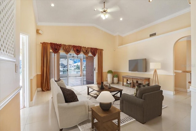 living room with ceiling fan, ornamental molding, high vaulted ceiling, and light tile patterned floors