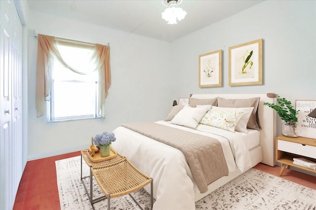 bedroom with wood-type flooring