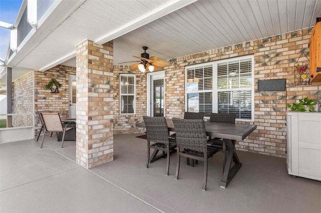 view of patio featuring a ceiling fan and outdoor dining area