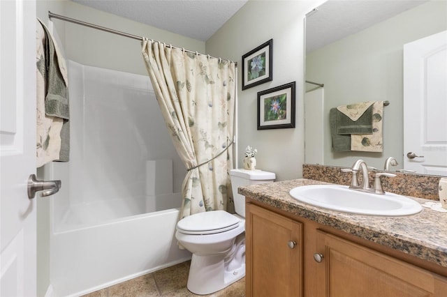 full bathroom with shower / bath combination with curtain, toilet, vanity, a textured ceiling, and tile patterned flooring