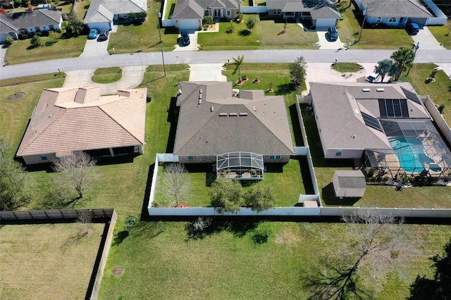 birds eye view of property with a residential view