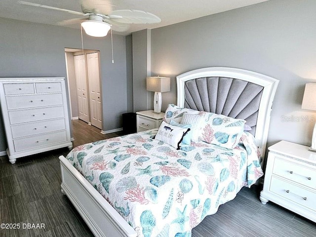 bedroom with ceiling fan and a closet