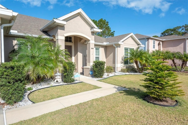 view of front facade with a front yard