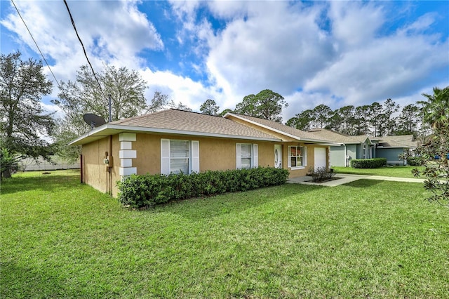 view of property exterior with a yard