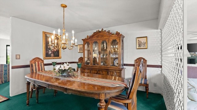 dining area featuring a chandelier and dark colored carpet