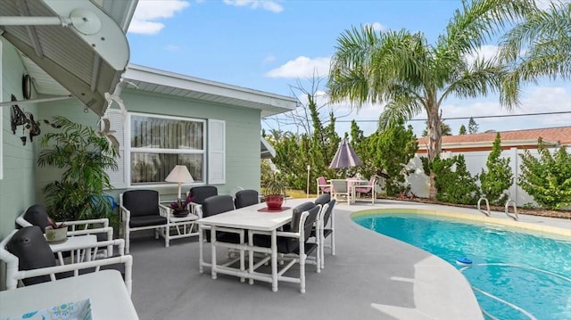 view of pool with a patio and an outdoor hangout area