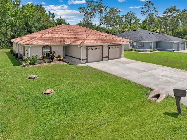 view of front of property featuring a garage, central AC unit, and a front lawn