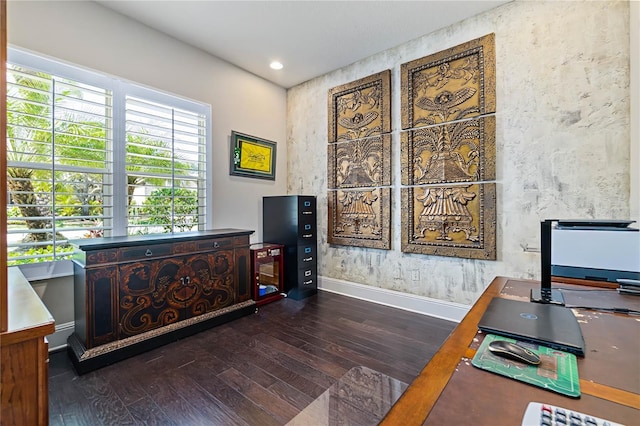 office space with dark wood-type flooring