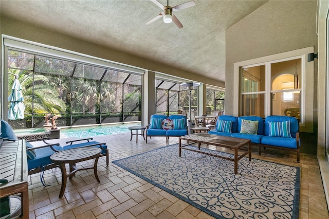 sunroom with ceiling fan