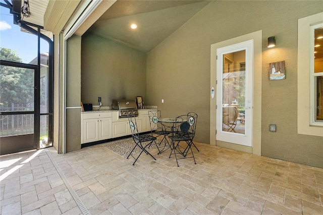 view of patio / terrace with area for grilling and an outdoor kitchen