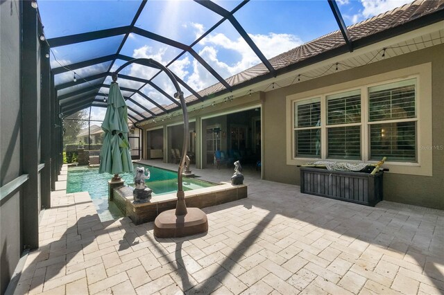 exterior space featuring outdoor lounge area and glass enclosure