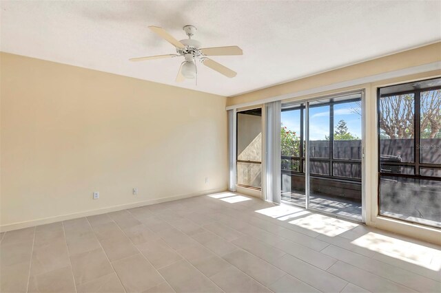 48 Club House Dr Unit 106, Palm Coast, FL 32137 - unfurnished room featuring a ceiling fan and baseboards