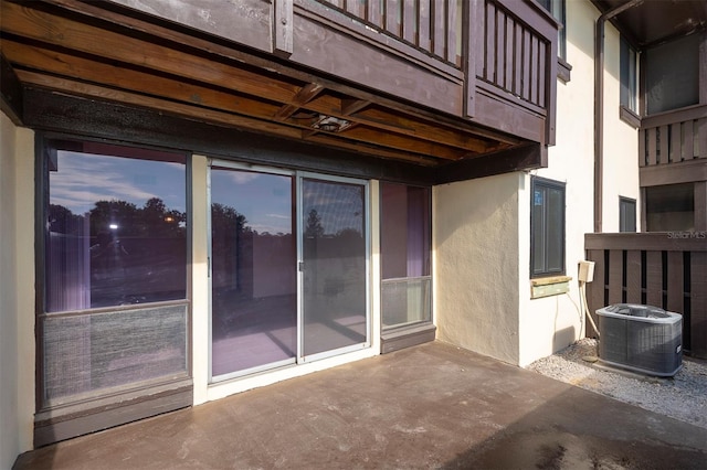 48 Club House Dr Unit 106, Palm Coast, FL 32137 - view of patio featuring central air condition unit and a balcony
