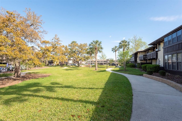 48 Club House Dr Unit 106, Palm Coast, FL 32137 - view of property's community featuring a lawn