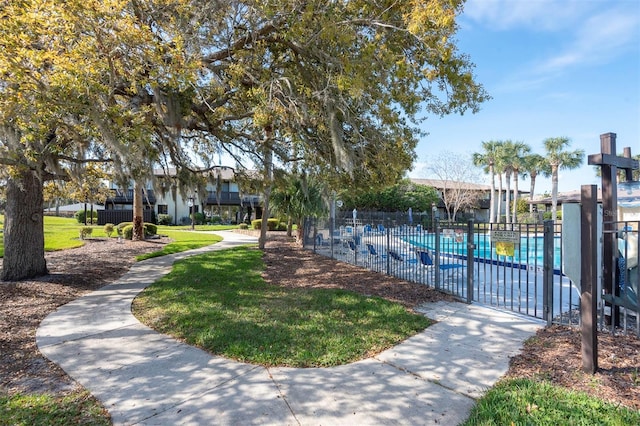 48 Club House Dr Unit 106, Palm Coast, FL 32137 - exterior space with fence and a yard