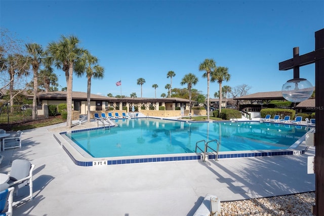 48 Club House Dr Unit 106, Palm Coast, FL 32137 - community pool featuring fence and a patio