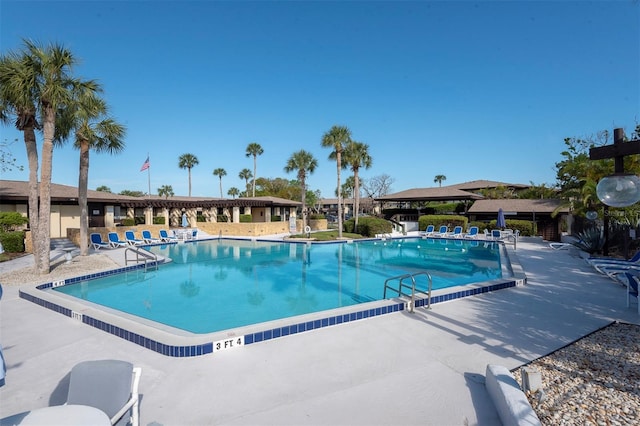 48 Club House Dr Unit 106, Palm Coast, FL 32137 - community pool featuring a patio area