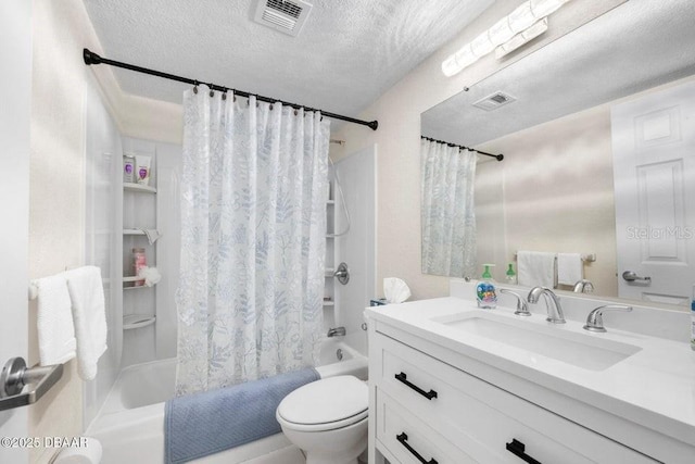 full bathroom featuring vanity, toilet, a textured ceiling, and shower / bath combo with shower curtain