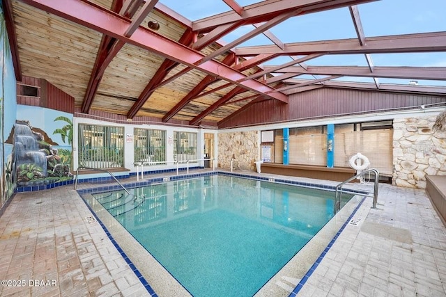 view of swimming pool featuring a patio area