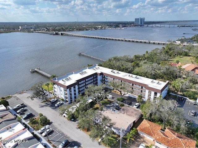 drone / aerial view with a water view