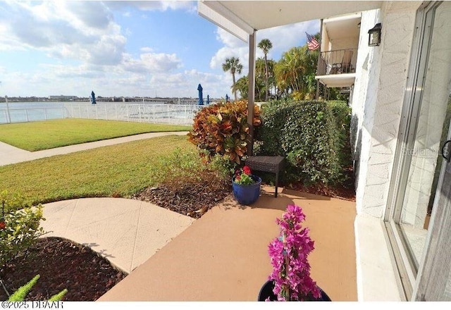 view of patio featuring a water view