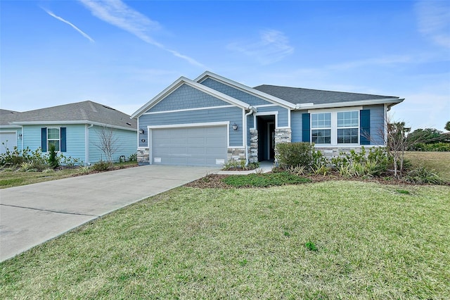 view of front of property with a garage and a front yard