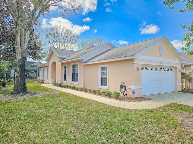 view of property exterior with a garage and a lawn