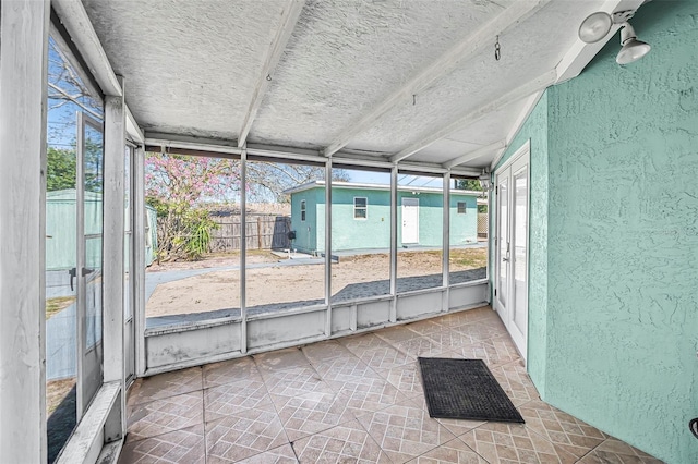 view of unfurnished sunroom