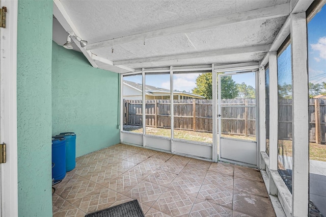 view of unfurnished sunroom