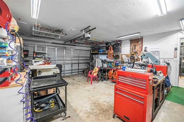 garage featuring a workshop area