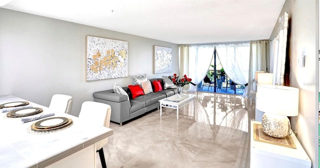 living area with a textured ceiling