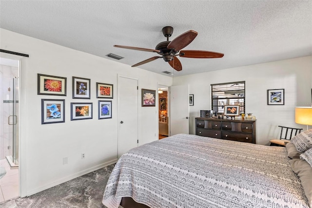 bedroom with ceiling fan and a textured ceiling