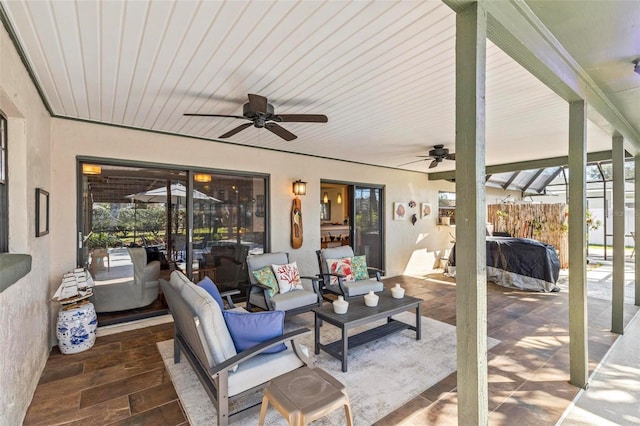 view of patio featuring outdoor lounge area and ceiling fan