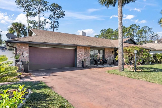 12 Bannerwood Ln, Palm Coast, FL 32137 - ranch-style home featuring a garage, concrete driveway, brick siding, a shingled roof, and a chimney