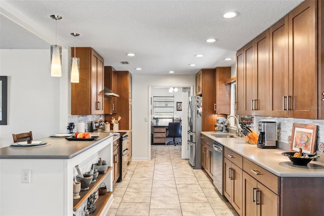 12 Bannerwood Ln, Palm Coast, FL 32137 - kitchen with appliances with stainless steel finishes, backsplash, open shelves, brown cabinetry, and recessed lighting