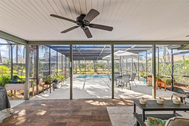 12 Bannerwood Ln, Palm Coast, FL 32137 - sunroom / solarium featuring a ceiling fan